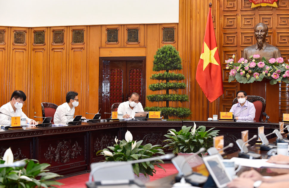 Đại diện lãnh đạo các Bộ tham gia họp thống nhất phải tiếp tục quyết liệt thực hiện các giải pháp phòng chống dịch. - Ảnh: VGP/Nhật Bắc