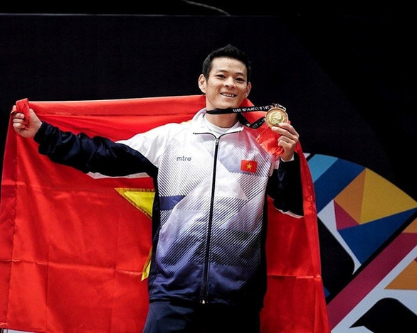 Thạch Kim Tuấn là một trong ba lực sĩ cử tạ Việt Nam giành vé đến Olympic Tokyo 2021 - Ảnh: NAM KHÁNH Thạch Kim Tuấn là một trong ba lực sĩ cử tạ Việt Nam giành vé đến Olympic Tokyo 2021 - Ảnh: NAM KHÁNH