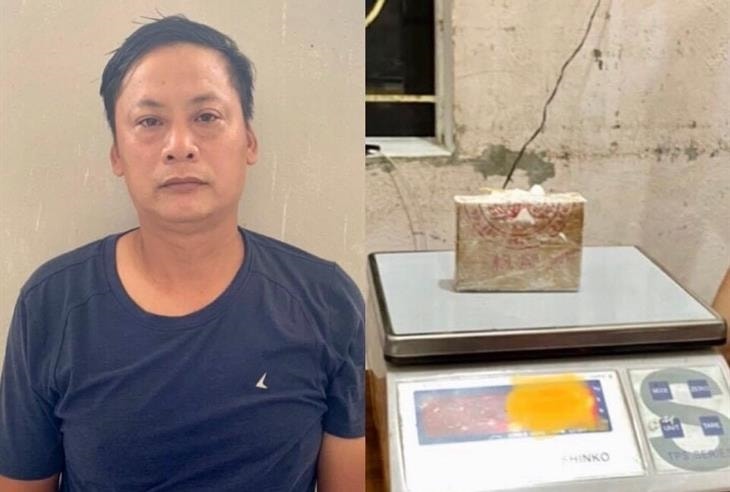 Đối tượng Đậu Đức Cảnh và tang vật. Ảnh: Hùng Phong Đối tượng Đậu Đức Cảnh và tang vật. Ảnh: Hùng Phong