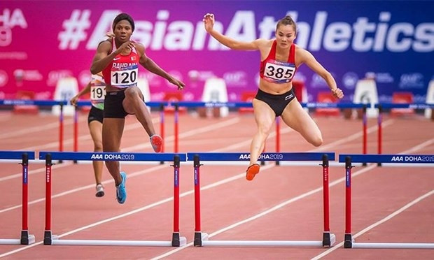 Vận động viên Điền kinh Quách Thị Lan giành huy chương vàng nội dung 400m rào châu Á. Ảnh: TTXVN