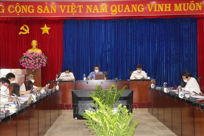 Phó Thủ tướng Vũ Đức Đam làm việc với lãnh đạo tỉnh Bình Dương về công tác phòng, chống dịch COVID-19 trên địa bàn tỉnh. Ảnh: TTXVN 