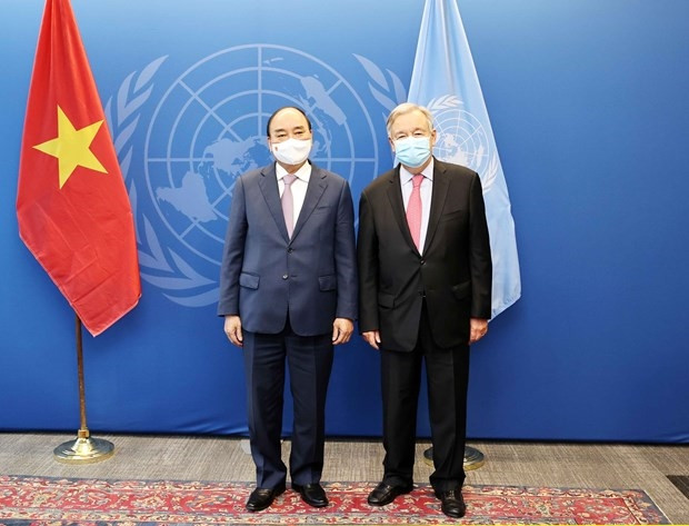 Chủ tịch nước Nguyễn Xuân Phúc gặp Tổng thư ký Liên hợp quốc Antonio Guterres. (Ảnh: Thống Nhất/TTXVN)