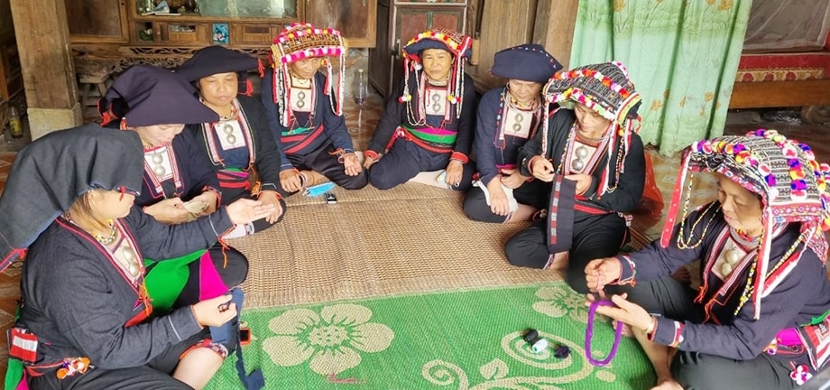 Với người Dao ở xã Minh An, gìn giữ bản sắc văn hóa là thể hiện tình yêu dân tộc. (Ảnh chụp trước ngày 27/4/2021)