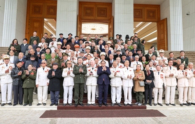 Thủ tướng Phạm Minh Chính và Đại tướng Tô Lâm, Bộ trưởng Bộ Công an chụp ảnh lưu niệm với các đại biểu - Ảnh: VGP/Nhật Bắc
