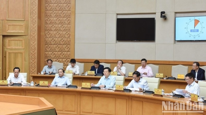 Các thành viên Chính phủ tham dự phiên họp. (Ảnh: TRẦN HẢI)