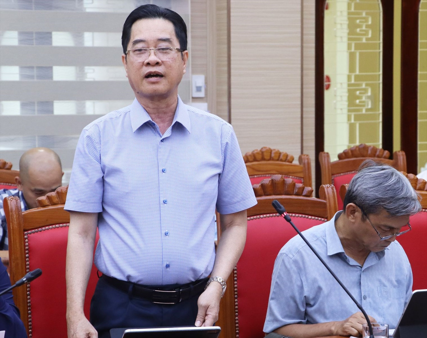 Ông Nguyễn Thành Hải, Giám đốc Sở Tài chính Bình Định báo cáo tại phiên họp