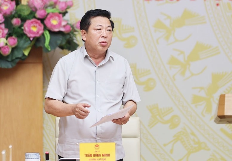 Bộ trưởng xây dựng Trần Hồng Minh phát biểu tại phiên họp - Ảnh: VGP/Nhật Bắc