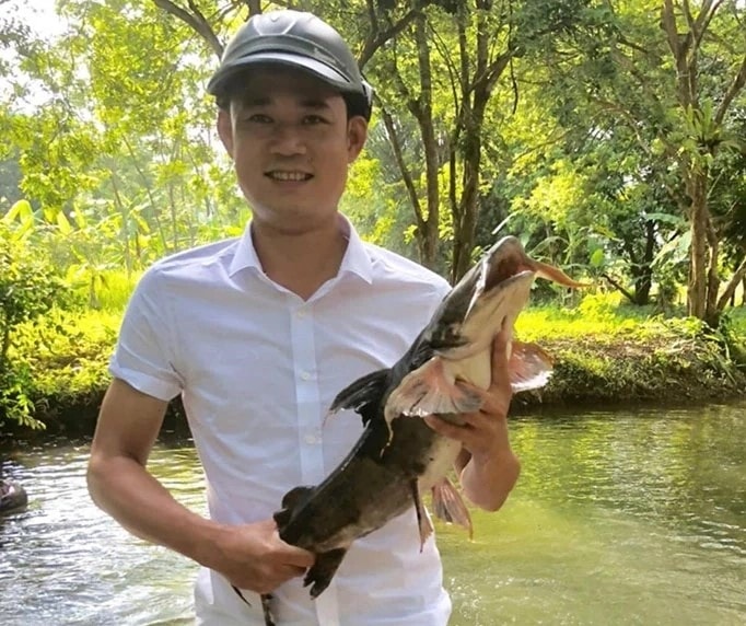Mô hình nuôi cá chiên của gia đình anh Cao Minh Nam (xã Bá Thước) đang mang lại hiệu quả kinh tế cao. (ảnh Q. Trâm)