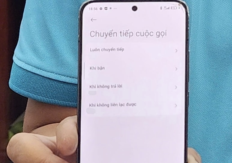 Cơ quan Công an làm việc với N.A.Q và hình ảnh thu thập từ điện thoại cho thấy Q đã chuyển cuộc gọi vào đường dây nóng Bộ Công an. (Ảnh Công an cung cấp).