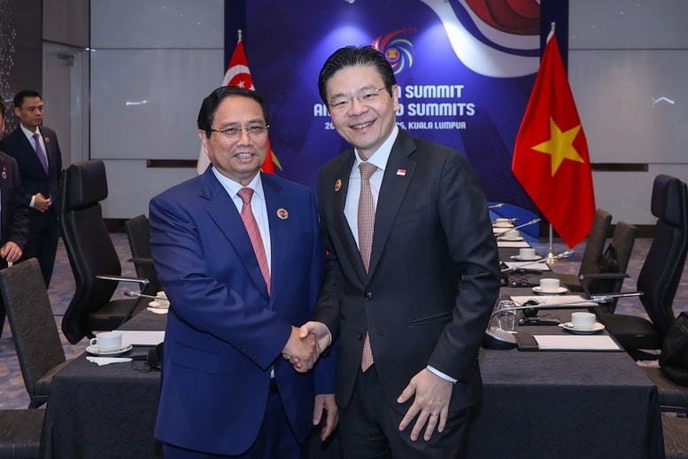 Thủ tướng Chính phủ Phạm Minh Chính và Thủ tướng Singapore Lawrence Wong họp thường niên lần thứ 2 - Ảnh: VGP/Nhật Bắc