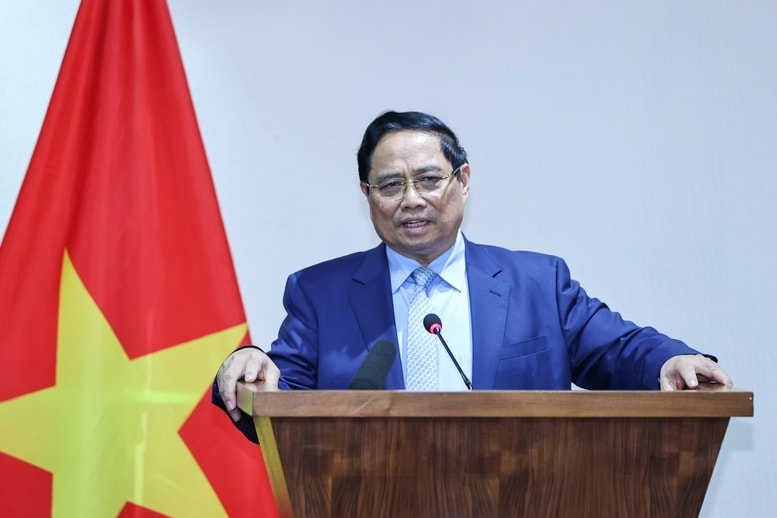 Thủ tướng Chính phủ Phạm Minh Chính thông tin tới bà con về tình hình trong nước, đặc biệt là những thành tựu đạt được kể từ khi Đổi mới - Ảnh: VGP/Nhật Bắc
