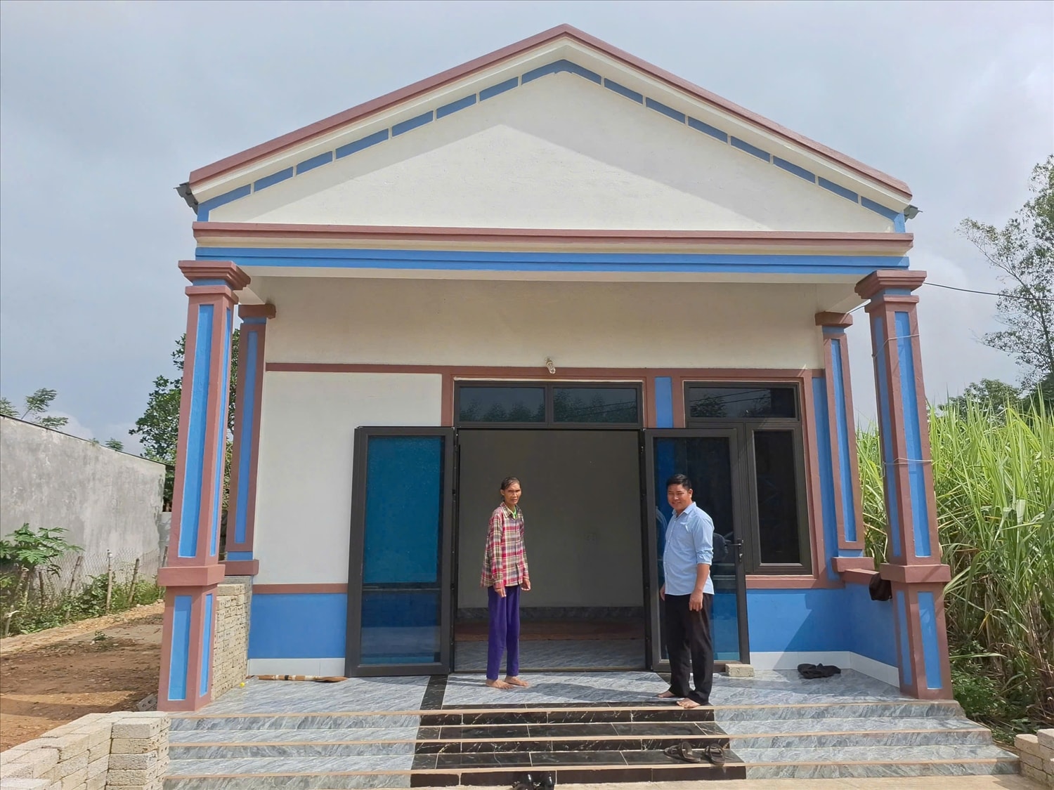 Việc hoàn thành mục tiêu xóa nhà tạm, nhà dột nát giúp hàng ngàn hộ gia đình có hoàn cảnh khó khăn về nhà ở  tại Nghệ An có điều kiện được an cư (Ảnh: Phạm Tiến) 