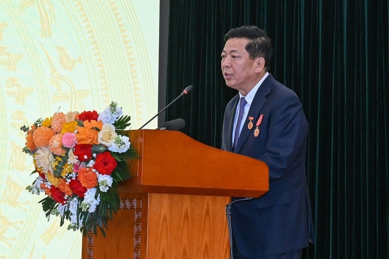 Bộ trưởng Bộ Xây dựng Trần Hồng Minh báo cáo tại Hội nghị - Ảnh: VGP/Nhật Bắc