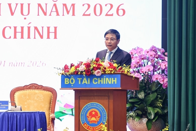 Bộ trưởng Bộ Tài chính Nguyễn Văn Thắng báo cáo tại Hội nghị - Ảnh: VGP/Nhật Bắc