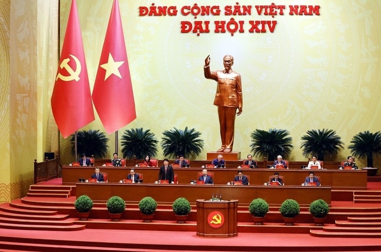 Ủy viên Bộ Chính trị, Chủ tịch nước Lương Cường điều hành phiên thảo luận tại hội trường sáng 21/1 - Ảnh: VGP/Nhật Bắc