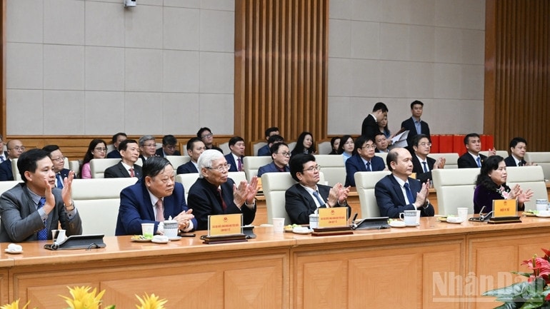 Các đại biểu tham dự cuộc gặp mặt. (Ảnh: TRẦN HẢI)